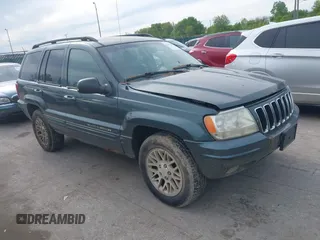 2002 Jeep Grand Cherokee Limited with VIN 1J8GW58N32C294112, listed as a IAAI auction lot 42342266 with 201,492 mi miles and . Bid and sale history available at DreamBid. Image 1.