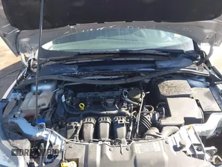 2014 Ford Focus Titanium with VIN 1FADP3J28EL354505, listed as a IAAI auction lot 42025966 with 104,868 mi miles. Bid and sale history available at carsss.com. Image 10.