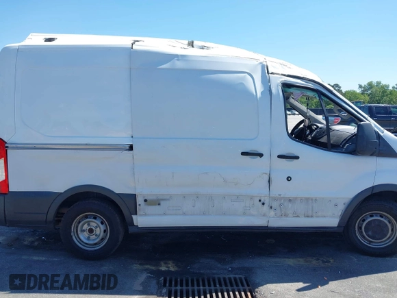 2017 Ford Transit Cargo z VIN 1FTYE1CM2HKB56212, wystawiony jako IAAI lot #42102063 z przebiegiem 174 769 mil mil oraz . Historia ofert i sprzedaży dostępna na DreamBid. Obrazek 6.