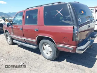 1999 Chevrolet Tahoe Z71 with VIN 1GNEK13R4XJ341736, listed as a IAAI auction lot 42218712 with 282,663 mi miles and . Bid and sale history available at DreamBid. Image 3.