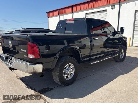 2012 Ram 2500 Laramie with VIN 3C6UD5FL7CG145550, listed as a Copart auction lot 53185415 with 311,929 mi miles and Clean Title. Bid and sale history available at carsss.com. Image 4.