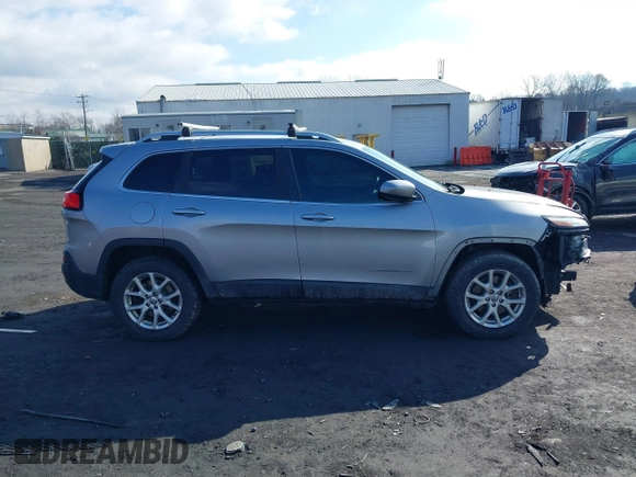 2014 Jeep Cherokee Altitude with VIN 1C4PJMCB5EW167961, listed as a IAAI auction lot 41660440 with 88,705 mi miles and . Bid and sale history available at DreamBid. Image 13.