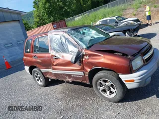 2000 Chevrolet Tracker z VIN 2CNBJ13C3Y6917675, wystawiony jako IAAI lot #42281654 z przebiegiem 153 805 mil mil oraz . Historia ofert i sprzedaży dostępna na DreamBid. Obrazek 14.