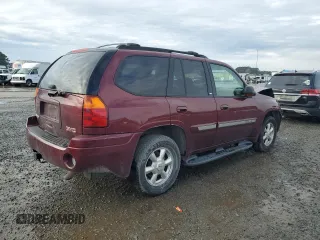 2003 GMC Envoy SLT with VIN 1GKDT13S032245485, listed as a Copart auction lot 84385304 with 139,183 mi miles and Salvage Title. Bid and sale history available at carsss.com. Image 3.