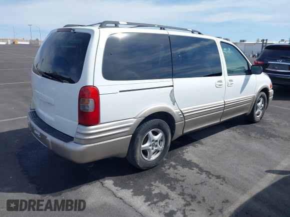 2002 Pontiac Montana with VIN 1GMDX03EX2D120237, listed as a IAAI auction lot 41858448 with 128,022 mi miles and . Bid and sale history available at DreamBid. Image 4.