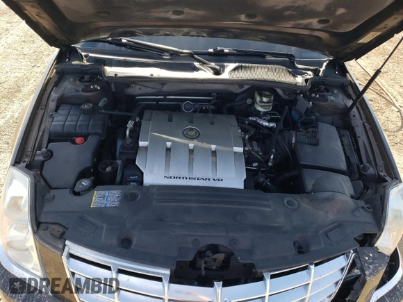 2008 Cadillac DTS 1SC z VIN 1G6KD57Y68U111388, wystawiony jako Copart lot #54204465 z przebiegiem 122 077 mil mil oraz Szkoda całkowita • Salvage title. Historia ofert i sprzedaży dostępna na DreamBid. Obrazek 11.