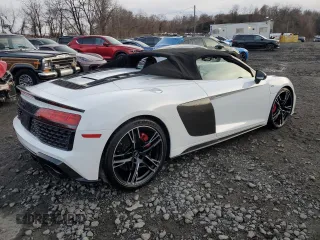 2020 Audi R8 Spyder performance z VIN WUA4BCFX3L7901606, wystawiony jako Copart lot #50161615 z przebiegiem 3 669 mil mil oraz Nie do naprawy • Non repairable. Historia ofert i sprzedaży dostępna na DreamBid. Obrazek 3.