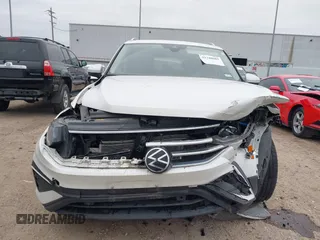 2023 Volkswagen Tiguan SE with VIN 3VVNB7AX8PM099759, listed as a IAAI auction lot 41340885 with 28,562 mi miles and . Bid and sale history available at DreamBid. Image 12.