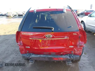 2009 Kia Sportage LX with VIN KNDJE723997634014, listed as a IAAI auction lot 41452224 with 148,643 mi miles. Bid and sale history available at carsss.com. Image 6.