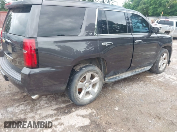 2015 Chevrolet Tahoe LT with VIN 1GNSCBKC4FR183580, listed as a IAAI auction lot 42318000 with Not provided miles and . Bid and sale history available at DreamBid. Image 4.