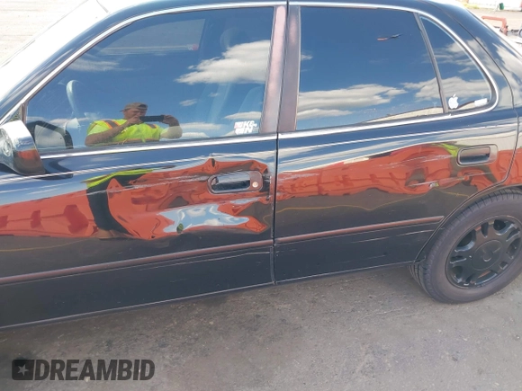 1996 Toyota Camry LE with VIN 4T1BF12K2TU863175, listed as a IAAI auction lot 42020895 with 245,443 mi miles and . Bid and sale history available at DreamBid. Image 18.
