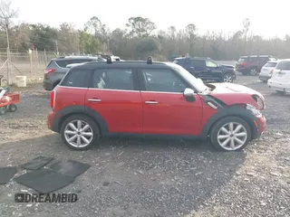2015 MINI Countryman S with VIN WMWZC3C50FWT05122, listed as a IAAI auction lot 41572503 with 120,885 mi miles and . Bid and sale history available at DreamBid. Image 13.