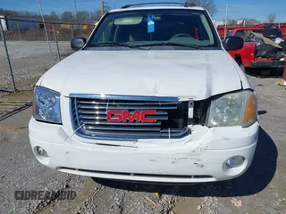 2007 GMC Envoy SLE with VIN 1GKDS13S772142847, listed as a IAAI auction lot 41605904 with 131,564 mi miles. Bid and sale history available at carsss.com. Image 10.