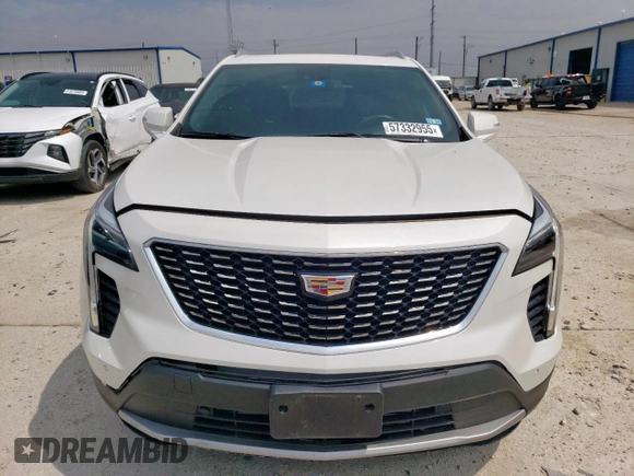 2023 Cadillac XT4 FWD Premium Luxury with VIN 1GYFZCR42PF110122, listed as a Copart auction lot 57332955 with 11,427 mi miles and Salvage title. Bid and sale history available at DreamBid. Image 5.