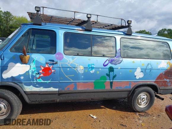 1995 Chevrolet Chevy Van z VIN 1GNEG25Z4SF221421, wystawiony jako IAAI lot #42003616 z przebiegiem 196 007 mil mil oraz . Historia ofert i sprzedaży dostępna na DreamBid. Obrazek 14.