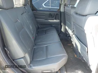 2008 Honda Ridgeline RTL z VIN 2HJYK16518H518451, wystawiony jako IAAI lot #42332723 z przebiegiem 295 375 mil mil oraz . Historia ofert i sprzedaży dostępna na DreamBid. Obrazek 8.