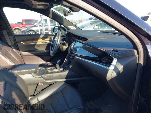2021 Cadillac XT6 Premium Luxury with VIN 1GYKPFRS9MZ141298, listed as a IAAI auction lot 41304705 with 87,470 mi miles. Bid and sale history available at carsss.com. Image 5.