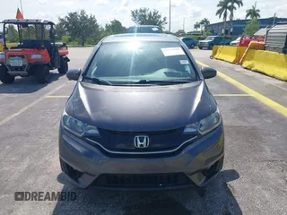 2015 Honda Fit EX-L z VIN 3HGGK5H89FM730013, wystawiony jako IAAI lot #42673309 z przebiegiem 142 660 mil mil oraz . Historia ofert i sprzedaży dostępna na DreamBid. Obrazek 12.