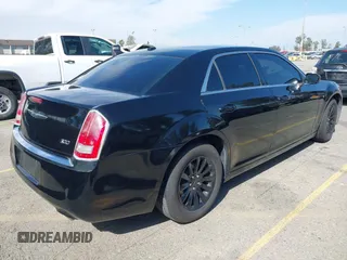 2014 Chrysler 300 with VIN 2C3CCAAG9EH264914, listed as a IAAI auction lot 42003052 with 103,789 mi miles. Bid and sale history available at carsss.com. Image 4.