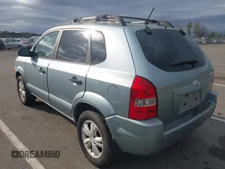2009 Hyundai Tucson GLS with VIN KM8JM12B79U991776, listed as a IAAI auction lot 42088648 with 219,207 mi miles. Bid and sale history available at carsss.com. Image 3.