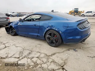 2023 Ford Mustang GT with VIN 1FA6P8CF9P5301583, listed as a Copart auction lot 57596535 with 19,916 mi miles and Salvage title. Bid and sale history available at DreamBid. Image 2.