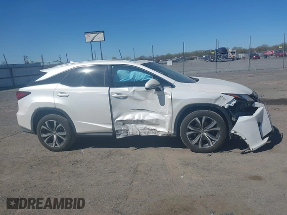 2018 Lexus RX 350 z VIN 2T2BZMCAXJC144930, wystawiony jako IAAI lot #41857778 z przebiegiem 108 191 mil mil oraz . Historia ofert i sprzedaży dostępna na DreamBid. Obrazek 13.