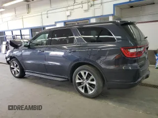 2015 Dodge Durango R/T with VIN 1C4SDJCT8FC772312, listed as a Copart auction lot 56235075 with 61,813 mi miles and Salvage title. Bid and sale history available at DreamBid. Image 2.