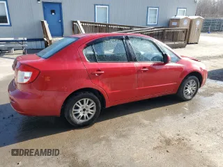 2012 Suzuki SX4 LE z VIN JS2YC5A34C6300969, wystawiony jako Copart lot #49036095 z przebiegiem 163 367 mil mil oraz Szkoda całkowita • Salvage title. Historia ofert i sprzedaży dostępna na DreamBid. Obrazek 3.