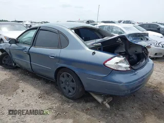 2001 Ford Taurus z VIN 1FAFP52211A244260, wystawiony jako IAAI lot #42099611 z przebiegiem 148 874 mil mil oraz . Historia ofert i sprzedaży dostępna na DreamBid. Obrazek 3.