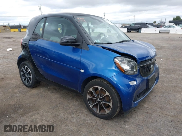 2016 Smart fortwo Passion z VIN WMEFJ5DA8GK059871, wystawiony jako IAAI lot #41624917 z przebiegiem 90 906 mil mil oraz . Historia ofert i sprzedaży dostępna na DreamBid. Obrazek 1.