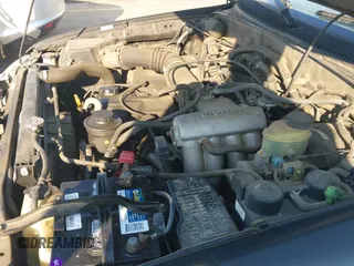 1999 Toyota Tacoma with VIN 4TANL42N8XZ465401, listed as a IAAI auction lot 43123683 with 210,909 mi miles and . Bid and sale history available at DreamBid. Image 12.