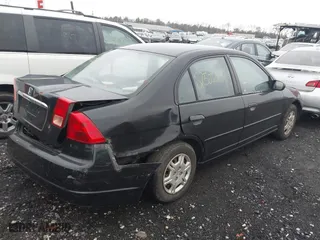 2001 Honda Civic LX with VIN 2HGES16511H554283, listed as a IAAI auction lot 41820187 with 999,999 mi miles. Bid and sale history available at carsss.com. Image 4.