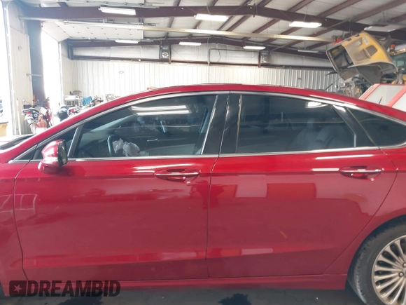 2016 Ford Fusion Titanium z VIN 3FA6P0K95GR119017, wystawiony jako IAAI lot #42148460 z przebiegiem 84 770 mil mil oraz . Historia ofert i sprzedaży dostępna na DreamBid. Obrazek 14.