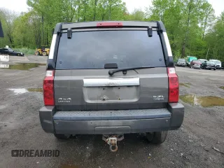2006 Jeep Commander Limited z VIN 1J8HG58236C299193, wystawiony jako Copart lot #55725905 z przebiegiem 171 946 mil mil oraz Szkoda całkowita • Salvage title. Historia ofert i sprzedaży dostępna na DreamBid. Obrazek 6.