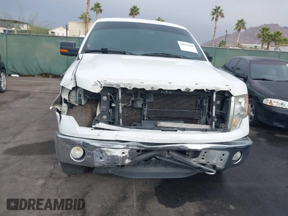 2013 Ford F-150 XL with VIN 1FTFW1ET7DKD70468, listed as a IAAI auction lot 40952588 with 208,052 mi miles. Bid and sale history available at carsss.com. Image 6.