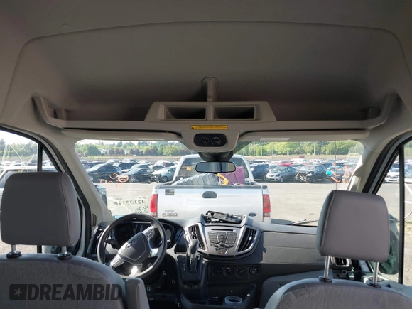 2015 Ford Transit Passenger XL z VIN 1FBAX2CG7FKA75719, wystawiony jako IAAI lot #42135118 z przebiegiem Nie podano mil oraz . Historia ofert i sprzedaży dostępna na DreamBid. Obrazek 21.