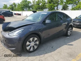 2023 Tesla Model Y Long Range z VIN 7SAYGDEE2PA041350, wystawiony jako Copart lot #56657005 z przebiegiem 25 090 mil mil oraz Szkoda całkowita • Salvage title. Historia ofert i sprzedaży dostępna na DreamBid. Obrazek 1.