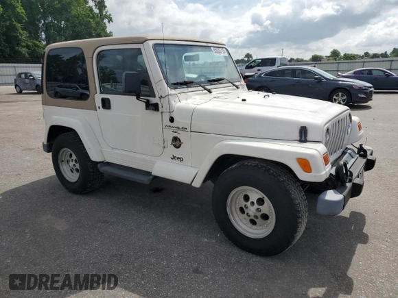 1999 Jeep Wrangler Sahara z VIN 1J4FY49S0XP432968, wystawiony jako Copart lot #65033715 z przebiegiem 126 420 mil mil oraz Szkoda całkowita • Salvage title. Historia ofert i sprzedaży dostępna na DreamBid. Obrazek 4.
