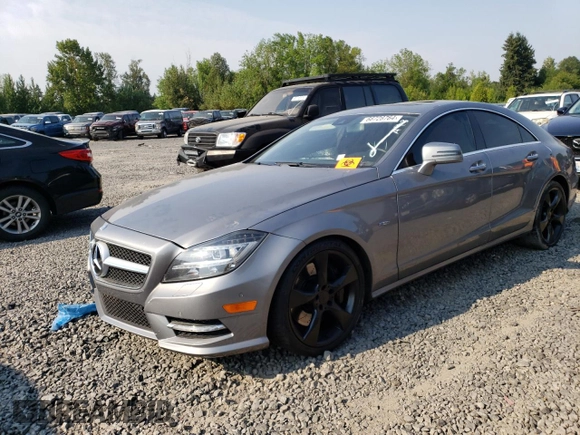 2012 Mercedes-Benz CLS-Class CLS 550 with VIN WDDLJ7DB8CA014201, listed as a Copart auction lot 66728764 with 92,854 mi miles and Salvage Title. Bid and sale history available at carsss.com. Image 1.