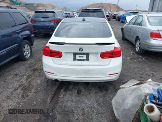 2018 BMW 3 Series 320i xDrive with VIN WBA8E5G52JNU46803, listed as a IAAI auction lot 41869625 with 67,057 mi miles. Bid and sale history available at carsss.com. Image 17.