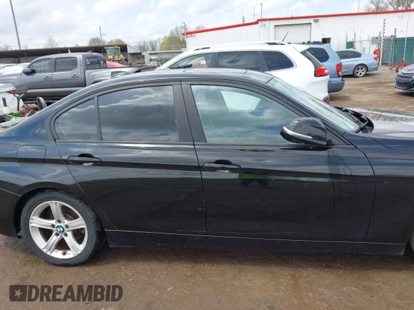2014 BMW 3 Series 328i xDrive with VIN WBA3B3C58EJ982424, listed as a IAAI auction lot 42075568 with 190,009 mi miles. Bid and sale history available at carsss.com. Image 13.