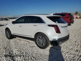 2022 Cadillac XT5 FWD Premium Luxury with VIN 1GYKNCRS1NZ125487, listed as a Copart auction lot 42081675 with 67,702 mi miles and Salvage title. Bid and sale history available at DreamBid. Image 2.