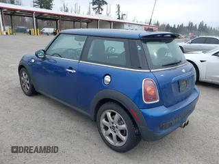 2007 MINI Hardtop S with VIN WMWMF73527TL91061, listed as a IAAI auction lot 41842104 with 65,259 mi miles and . Bid and sale history available at DreamBid. Image 3.