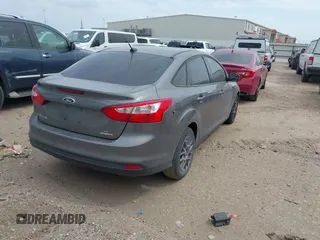 2013 Ford Focus SE z VIN 1FADP3F23DL159239, wystawiony jako IAAI lot #42076471 z przebiegiem 111 346 mil mil oraz . Historia ofert i sprzedaży dostępna na DreamBid. Obrazek 4.