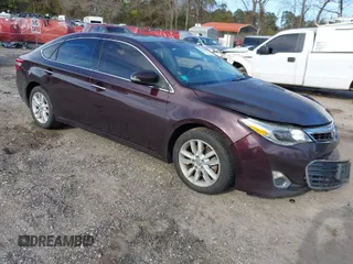 2013 Toyota Avalon XLE with VIN 4T1BK1EB1DU026863, listed as a IAAI auction lot 41644969 with 190,020 mi miles and . Bid and sale history available at DreamBid. Image 1.