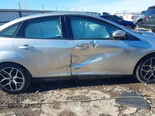 2017 Ford Focus SEL with VIN 1FADP3H24HL327179, listed as a IAAI auction lot 41607974 with 86,306 mi miles. Bid and sale history available at carsss.com. Image 13.