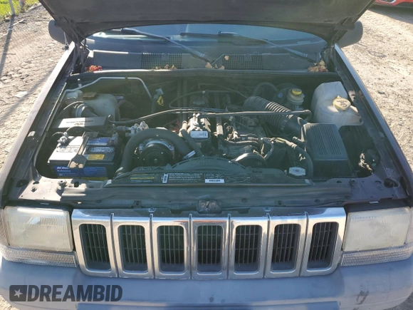 1998 Jeep Grand Cherokee Laredo with VIN 1J4FX58SXWC144715, listed as a Copart auction lot 86423594 with 93,936 mi miles and Clean Title. Bid and sale history available at carsss.com. Image 11.