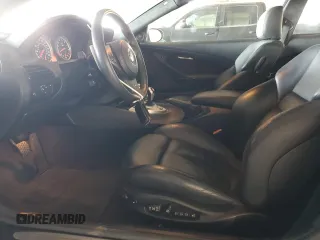 2006 BMW M6 with VIN WBSEH934X6B797428, listed as a Copart auction lot 63462135 with 73,393 mi miles and Salvage title. Bid and sale history available at DreamBid. Image 7.