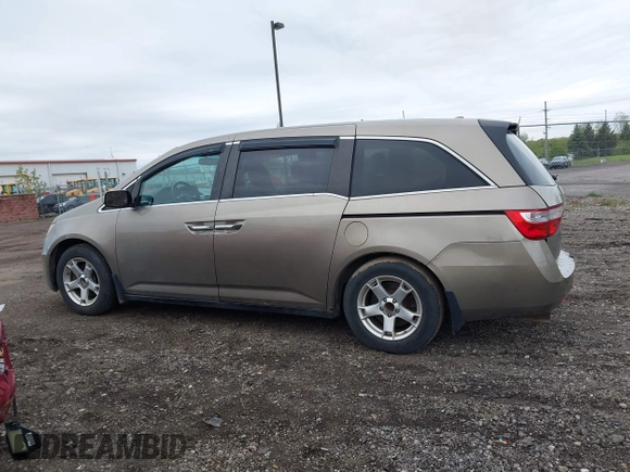 2012 Honda Odyssey EX-L with VIN 5FNRL5H68CB031930, listed as a IAAI auction lot 42222501 with 65,262 mi miles and . Bid and sale history available at DreamBid. Image 14.