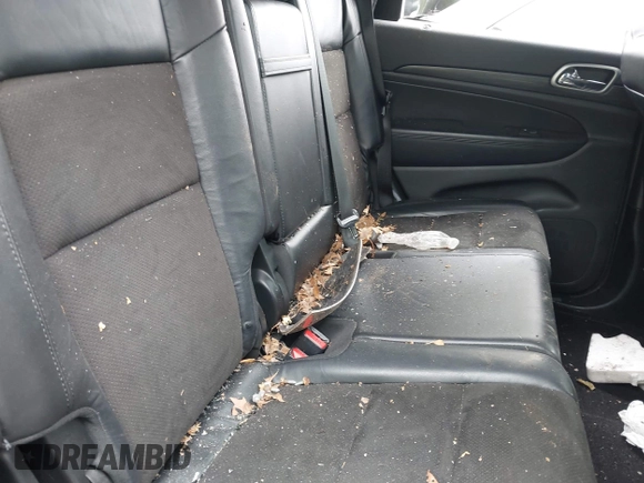 2019 Jeep Grand Cherokee Laredo E with VIN 1C4RJFAG5KC567003, listed as a IAAI auction lot 42390239 with 82,505 mi miles and . Bid and sale history available at DreamBid. Image 8.
